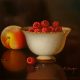 Ronald Berger Peach and Raspberries still life painting original Dutch style oil painting of fruit bowl in traditional realistic style